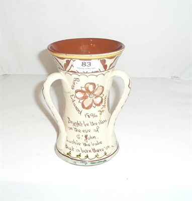 Lot 83 - Prince Edward of York commemorative three handled vase, 1894