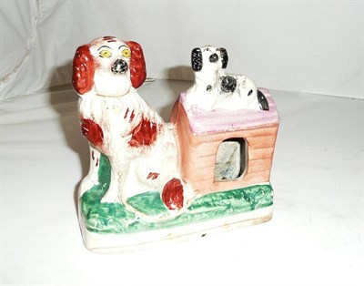 Lot 86 - Staffordshire figure with dog's kennel