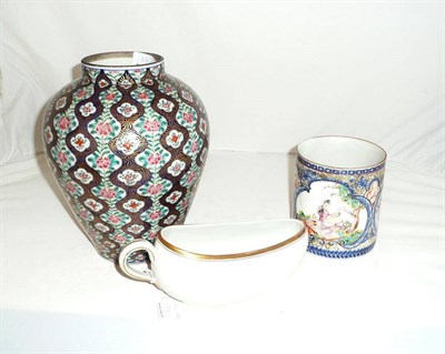 Lot 137 - Wedgwood bordalue, floral decorated vase and an 18th century Chinese tankard (restored)