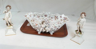 Lot 156 - Continental oval figural dish and a pair of Naples figures (3)