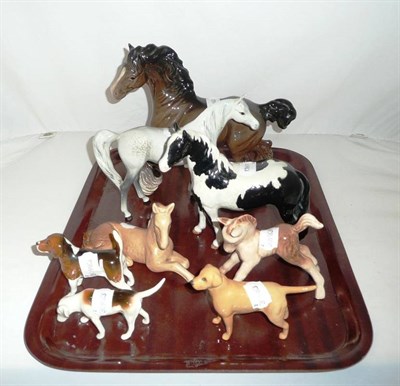 Lot 161 - Three Beswick horses, three hounds and two Sylvac horses