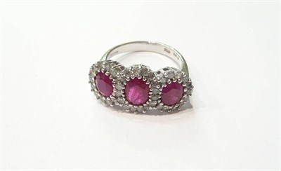 Lot 174 - Ruby and diamond ring