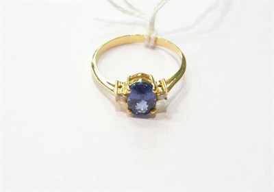 Lot 175 - Blue sapphire and diamond ring