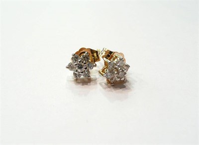 Lot 192 - A pair of diamond cluster earrings