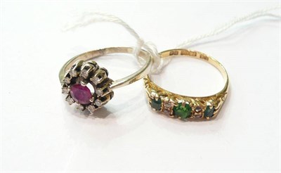 Lot 206 - A ruby and diamond cluster ring and a Victorian emerald and diamond set ring