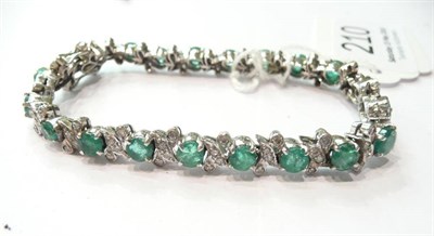 Lot 210 - An emerald and diamond bracelet