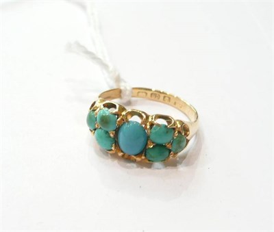 Lot 211 - A turquoise set 18ct gold ring