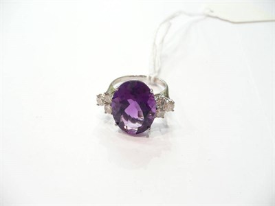 Lot 213 - A 14ct white gold, amethyst and diamond ring