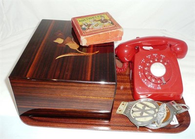 Lot 279 - Auctioneer parlour game, red circa 1960's telephone, three car badges and a humidor