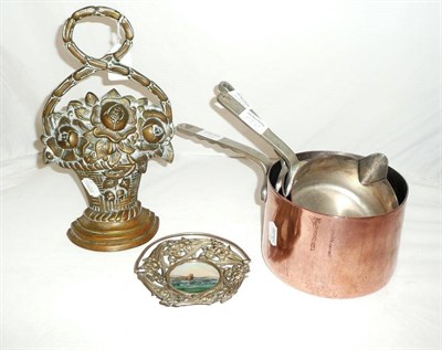 Lot 282 - An Isle of Man gem basket, three copper saucepans, a doorstop