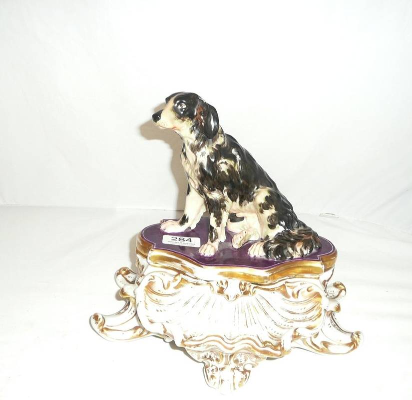 Lot 284 - Staffordshire porcelain inkwell surmounted with the figure of a dog