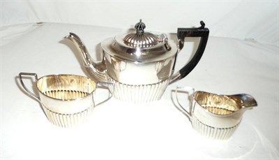 Lot 299 - A three piece composite silver teaset