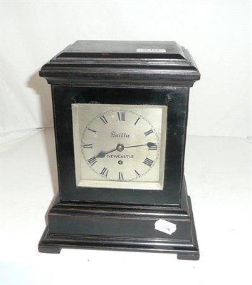 Lot 310 - A single fusee mantel clock "Baillie Newcastle" in ebonized mahogany case, keys and pendulum