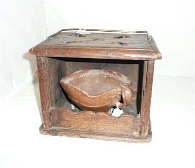 Lot 319 - An oak foot warmer, Dutch, 18th century, of rectangular section, the harebell pierced...