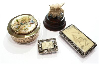 Lot 324 - Two ivory and white metal dress clips, mother-of-pearl mounted round box and a small ivory elephant