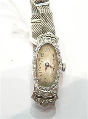 Lot 338 - An 18ct white gold diamond-set wristwatch