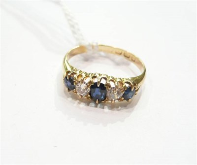 Lot 341 - A sapphire and diamond five stone ring