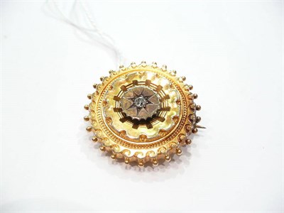 Lot 342 - A diamond set circular brooch