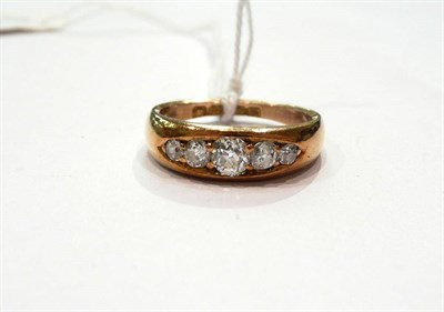 Lot 345 - An 18ct gold and diamond gypsy set ring