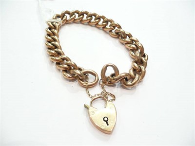 Lot 374 - A 9ct rose gold curb and lock bracelet