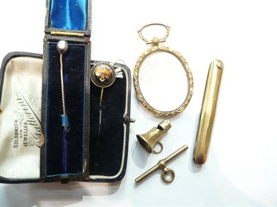 Lot 406 - A 9ct gold penknife, a whistle, a bar, a gilt miniature frame and two stick pins