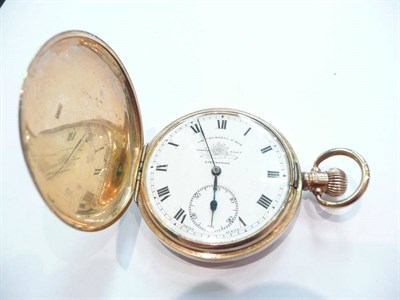 Lot 433 - A 9ct gold full hunting cased pocket watch signed Thos Russell & Son