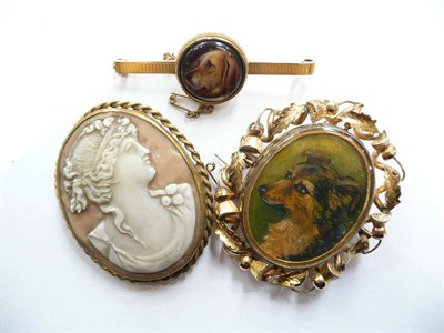 Lot 441 - Cameo brooch, dog portrait brooch within thistle border brooch and a 15ct gold bar brooch with...