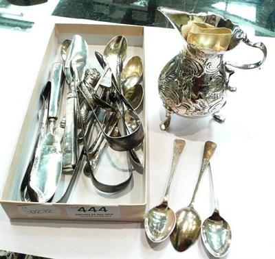 Lot 444 - Georgian silver embossed cream jug and various silver flatware