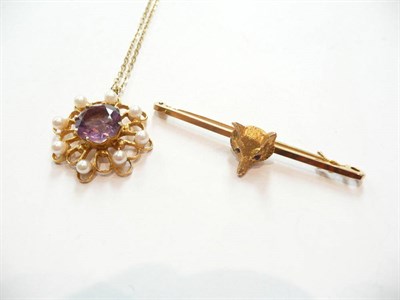 Lot 475 - A 9ct gold fox mask stock pin and an amethyst and seed pearl pendant and chain