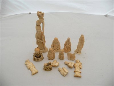 Lot 480 - Group of carved ivory figures, netsuke etc