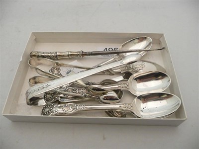 Lot 496 - Quantity of silver spoons, tongs and button hook