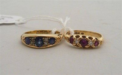 Lot 505 - An 18ct gold sapphire and diamond ring, and a ruby and diamond ring (2)