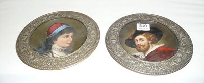 Lot 510 - A pair of painted porcelain shallow circular dishes, German, circa 1870, one painted with a bearded