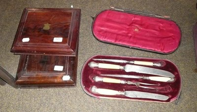 Lot 521 - Two mahogany-cased sets of plated flatware and a cased carving set