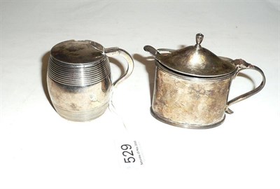 Lot 529 - A George III barrel shaped silver mustard pot and another