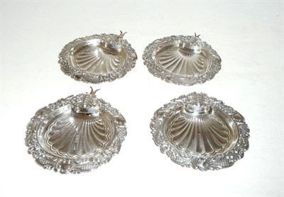 Lot 532 - Set of four silver shell-shaped 'plate' trays