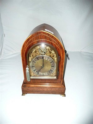 Lot 576 - A rosewood cased lancet mantle clock, movement stamped W&H SCH., probably German