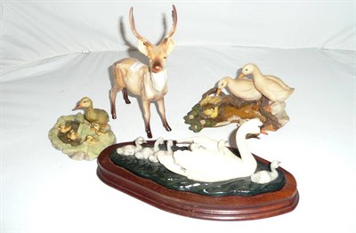 Lot 584 - Beswick stag, Border Fine Arts swan, duck with ducklings and an Aynsley duck group