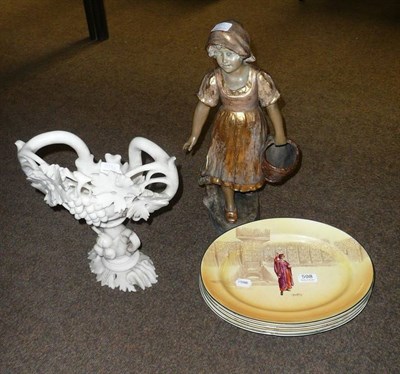 Lot 598 - Four Royal Doulton oval plates, alabaster centrepiece and a German pottery figure of a young...