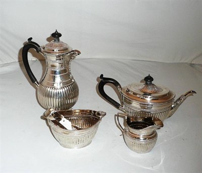 Lot 602 - A Victorian silver four piece morning tea service and a pair of sugar tongs