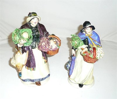 Lot 606 - Two slip case pottery figures in the manner of Charles Vyse (some damage)