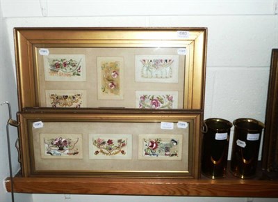 Lot 680 - Three framed groups of World War I silk postcards and two gun cartridges