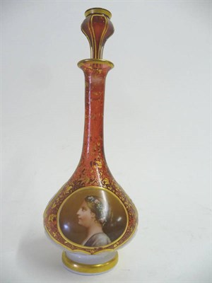 Lot 3 - A Bohemian Ruby Glass Scent Bottle and Stopper, circa 1870, the long tapered neck and bulbous...