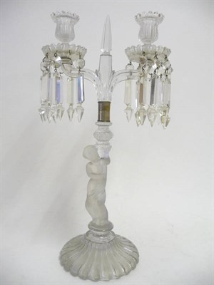 Lot 4 - A Moulded Glass Two-Branch Table Candelabrum, probably Baccarat, circa 1870, with central hexagonal