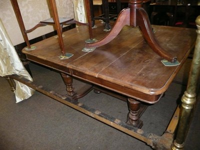 Lot 726 - Continental walnut extending table