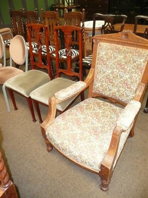 Lot 778 - A carved oak open arm chair and a pair of salon chairs