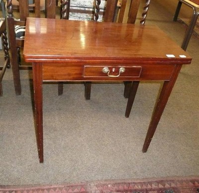 Lot 783 - A George III mahogany fold-over tea table