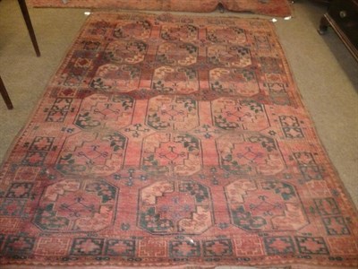 Lot 784 - Caucasian red ground rug and another similar carpets/rugs, and a blue patterned eastern rug...