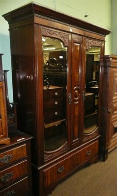 Lot 817 - Mahogany and walnut double wardrobe and a dressing table