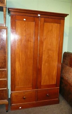 Lot 819 - A mahogany two door wardrobe